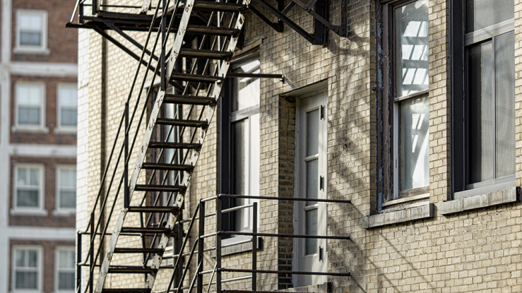 View of an apartment building fire escape.