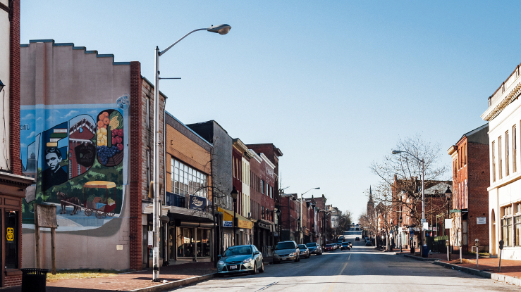 View of a street in a small downtown area.