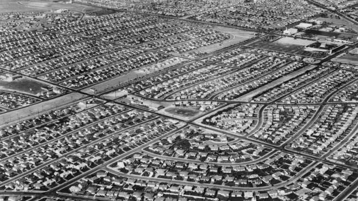 Aerial view of suburban single-family homes in the 1940s.