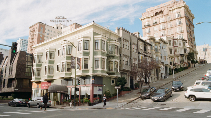 Small multifamily building in a busy neighborhood.