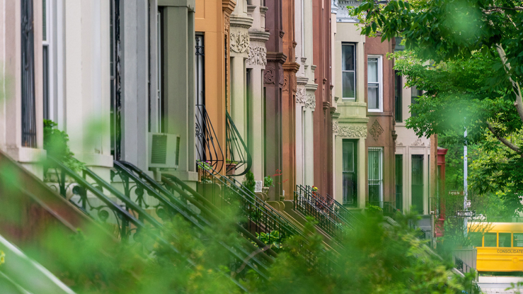 Block of townhouses with staircases.