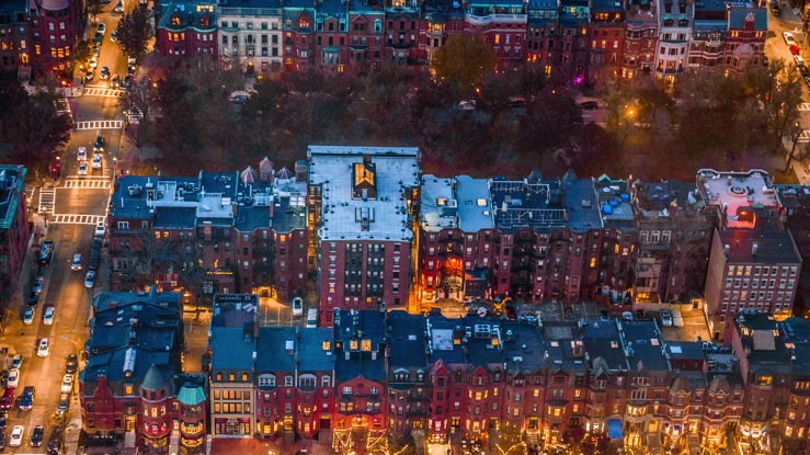 Aerial view of an urban neighborhood at night.