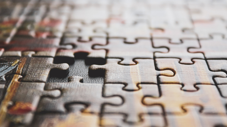 Puzzle with missing piece.