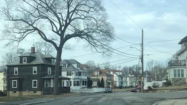 View of a residential street in Brockton, MA.