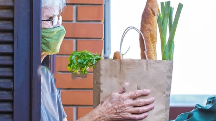 Woman receiving groceries