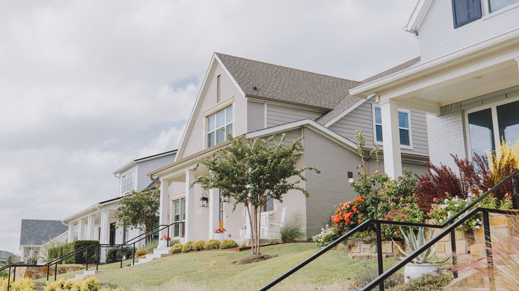 Row of houses with stairways in front.