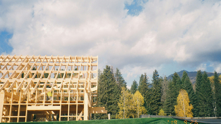 House under construction in suburban neighborhood.