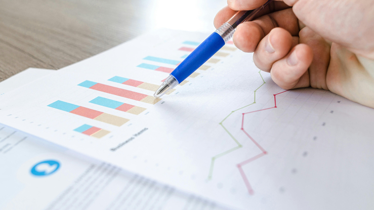 Person examining charts