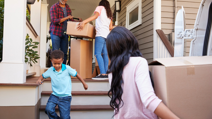 Family moving into a home.
