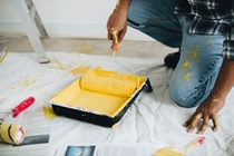 Man using a paint roller