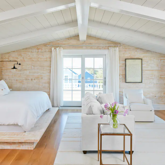 View of a white bedroom.