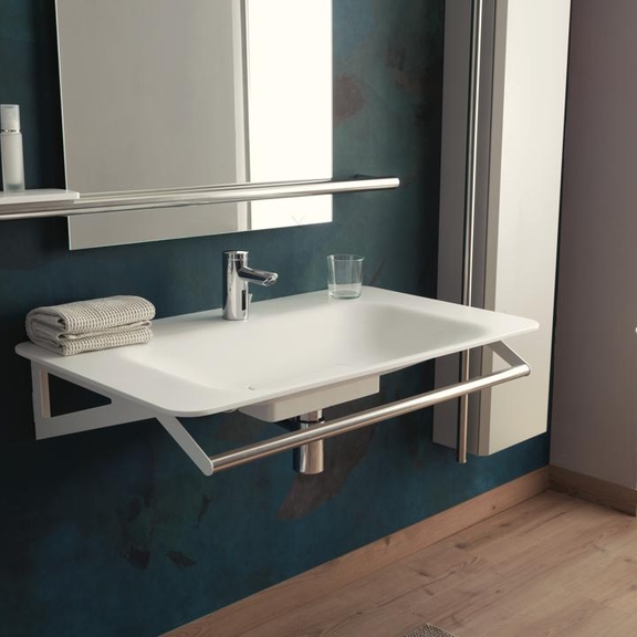 View of a sink with supportive bar built in.
