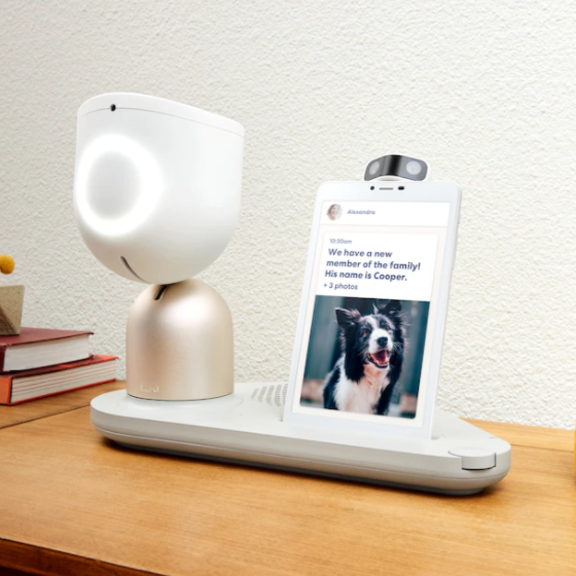 View of EllieQ robot sitting on table.
