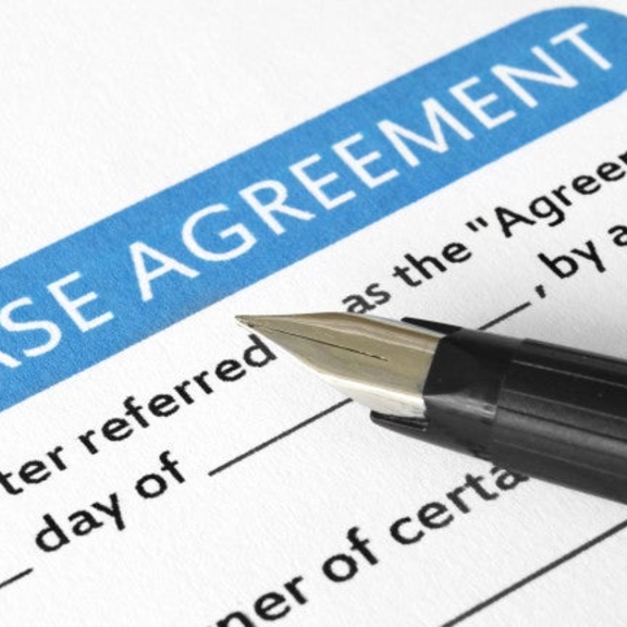 Lease agreement with pen.