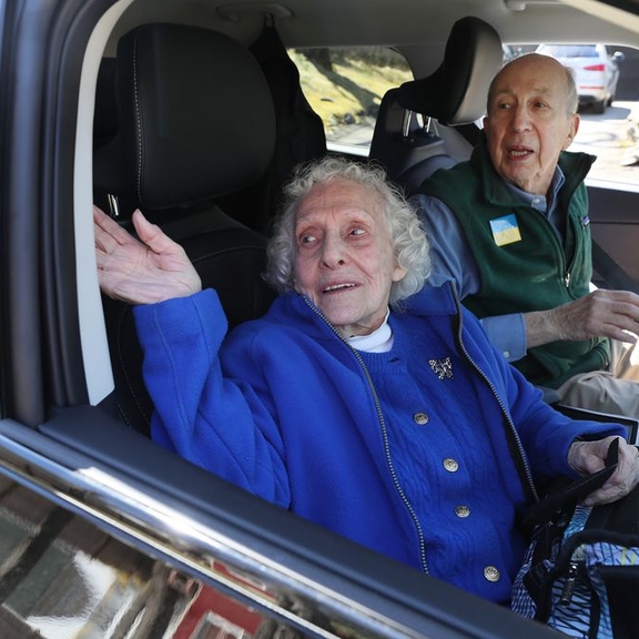 Old couple in car.