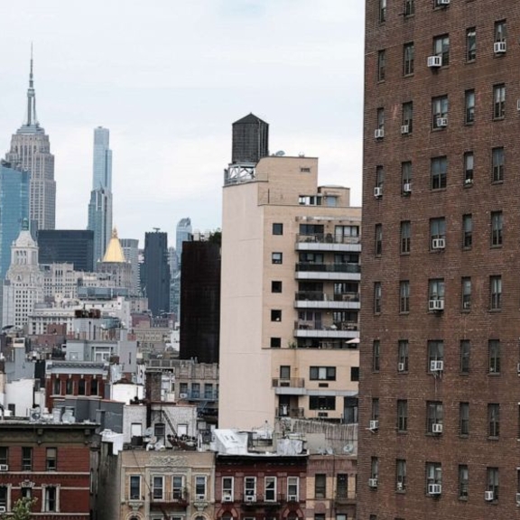 View of NYC skyline and apartment buildings.