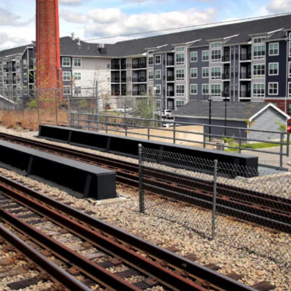 Apartments next to a rail station.