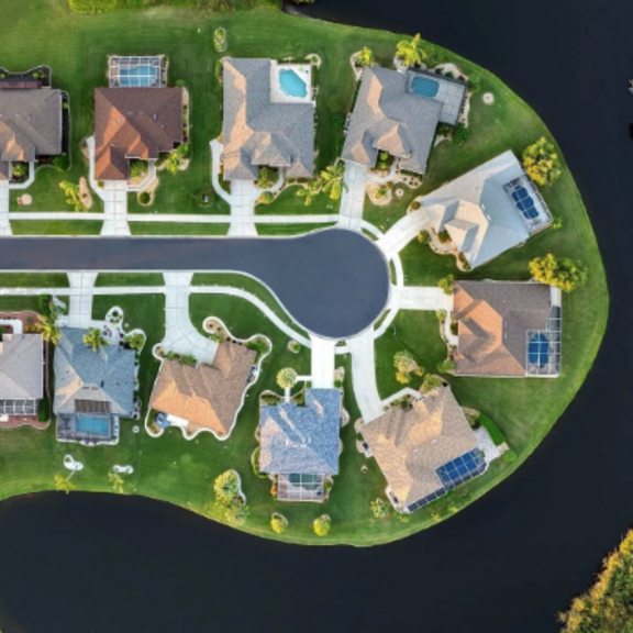 Aerial view of suburban homes lining a cul de sac.
