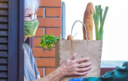 Woman receiving groceries