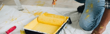 Man using a paint roller