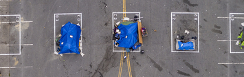 Aerial view of a city sanctioned camp for people experiencing homelessness in San Francisco blocks from City Hall.