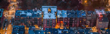 Aerial view of an urban neighborhood at night.