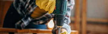 Woman using a drill