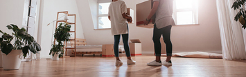 Couple moving into new home.