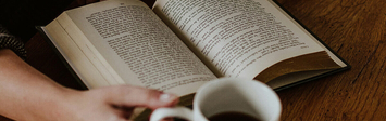 Person reading a book.