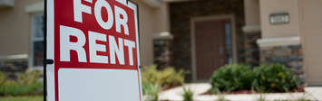 For Rent sign in front of a house.