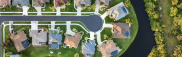 Aerial view of suburban homes lining a cul de sac.