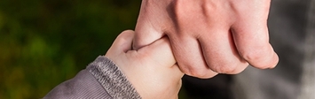 adult_child_hand.jpg